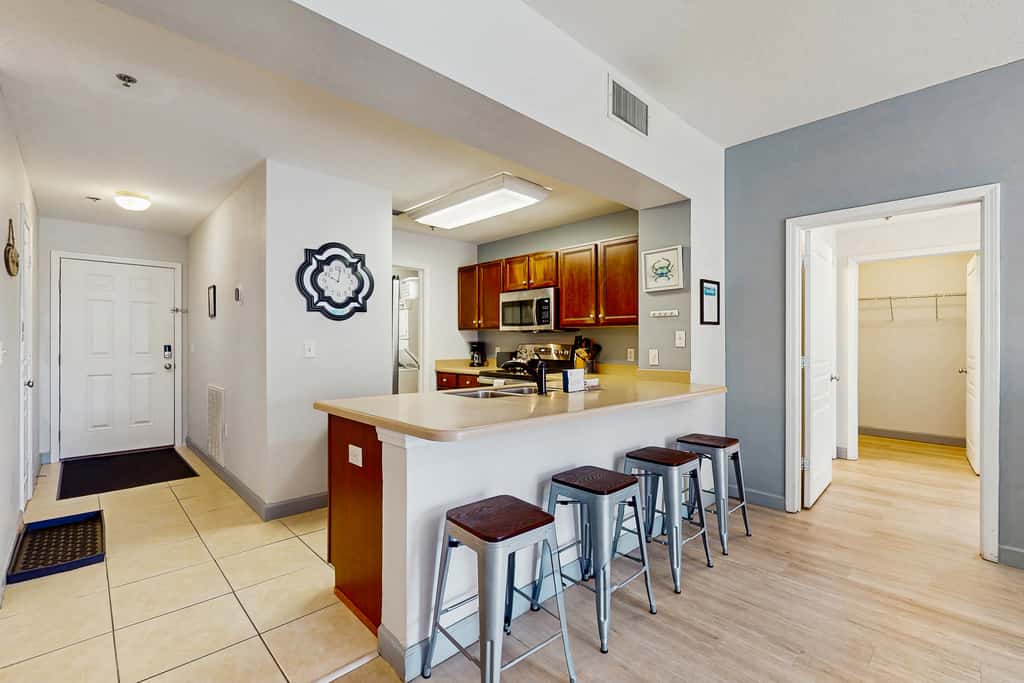 Waterfront Home Close to Beach with Shared Pool, Hot Tub, Free WiFi, & Central AC