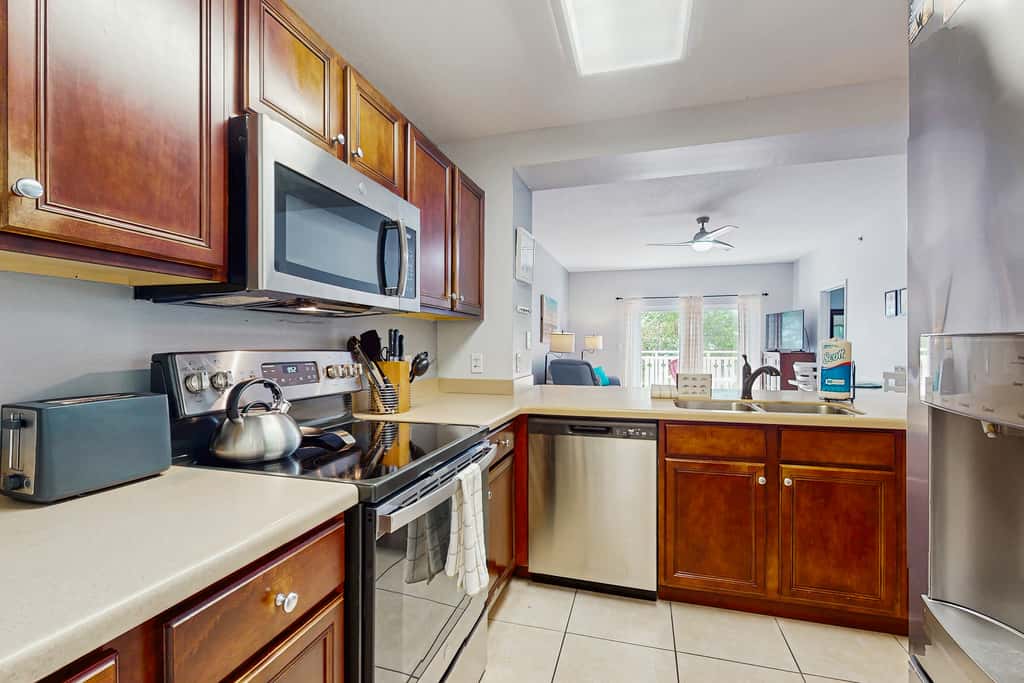 Waterfront Home Close to Beach with Shared Pool, Hot Tub, Free WiFi, & Central AC