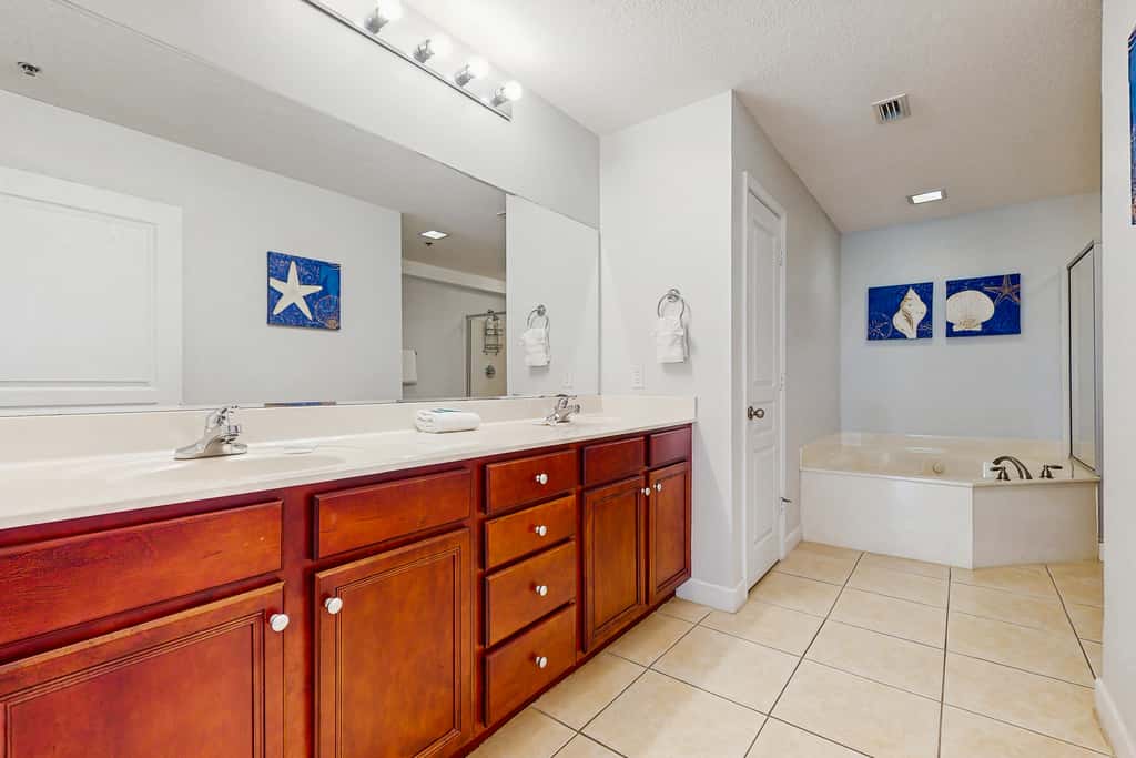 Waterfront Home Close to Beach with Shared Pool, Hot Tub, Free WiFi, & Central AC