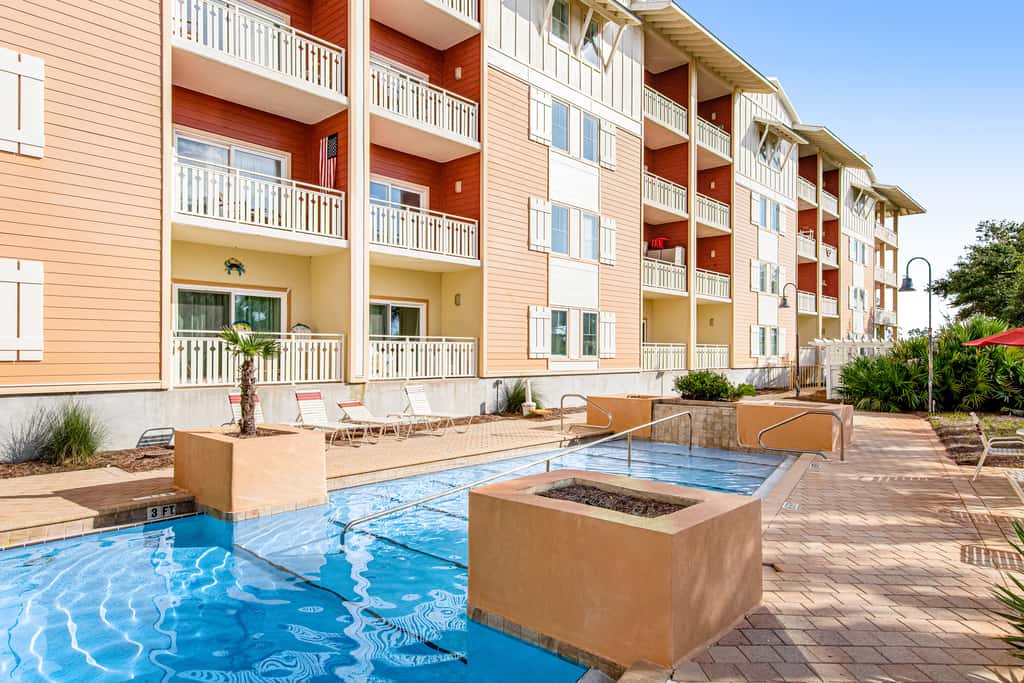 Waterfront Home Close to Beach with Shared Pool, Hot Tub, Free WiFi, & Central AC