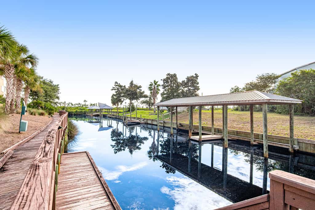 Waterfront Home Close to Beach with Shared Pool, Hot Tub, Free WiFi, & Central AC