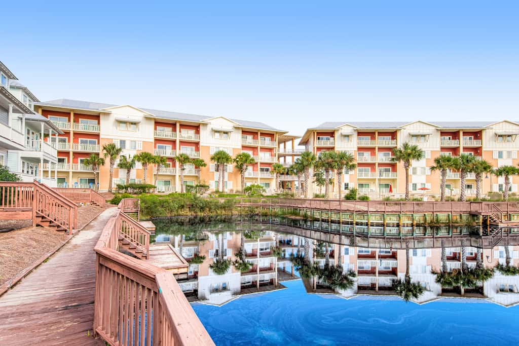 Waterfront Home Close to Beach with Shared Pool, Hot Tub, Free WiFi, & Central AC
