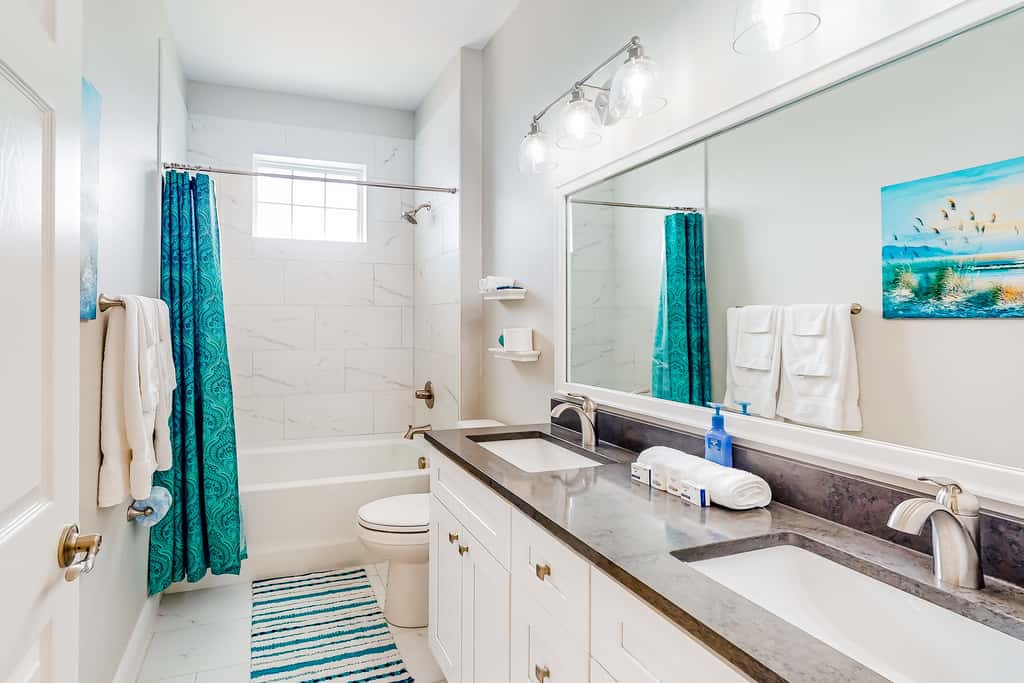 Dog-friendly coastal abode with a grill, central AC, updated interior & patio