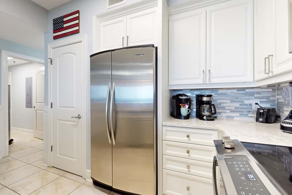 gulf front condo steps from the sand with shared pool,hot tub & more
