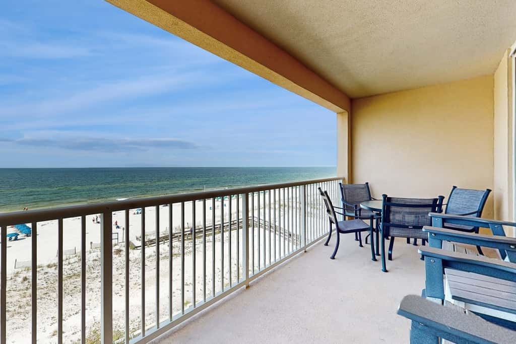 gulf front condo steps from the sand with shared pool,hot tub & more