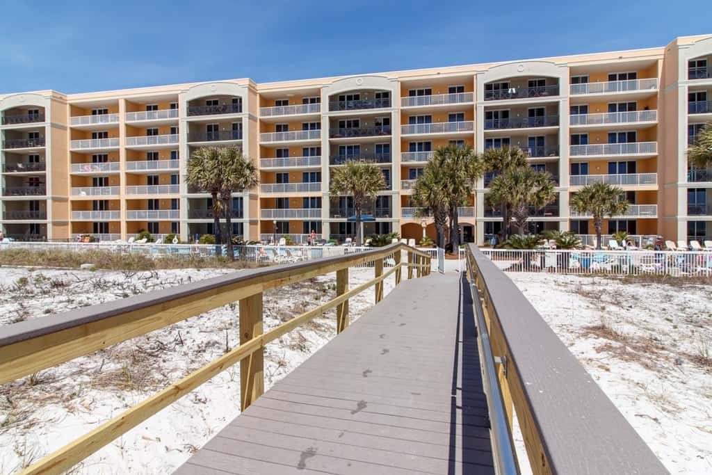 gulf front condo steps from the sand with shared pool,hot tub & more