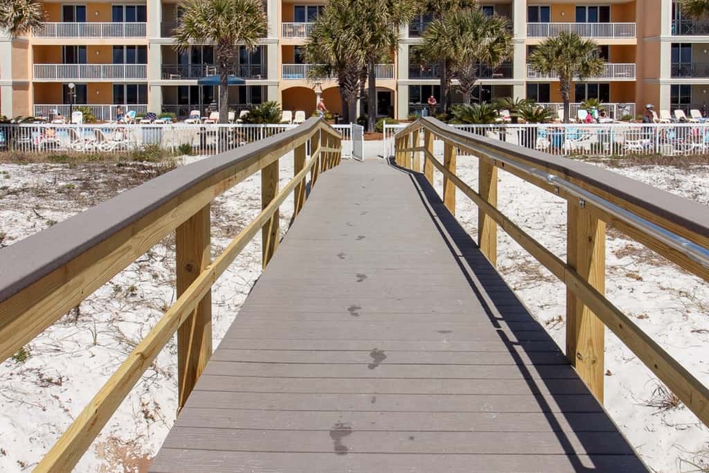 gulf front condo steps from the sand with shared pool,hot tub & more