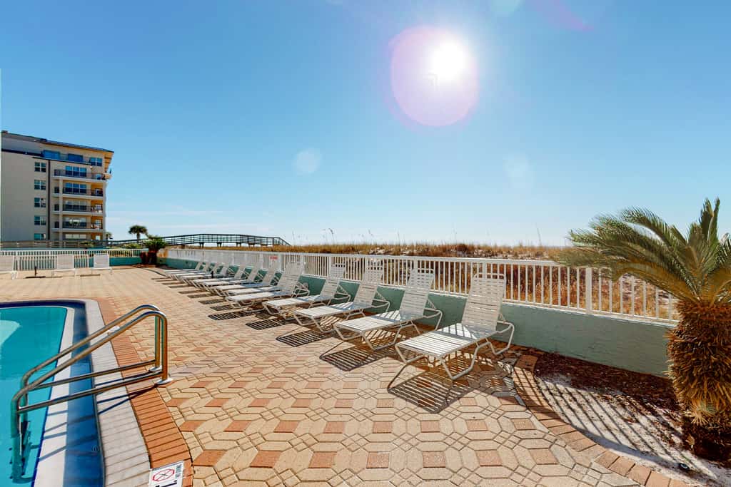 Beautiful beachfront condo with shared pool & beach access!