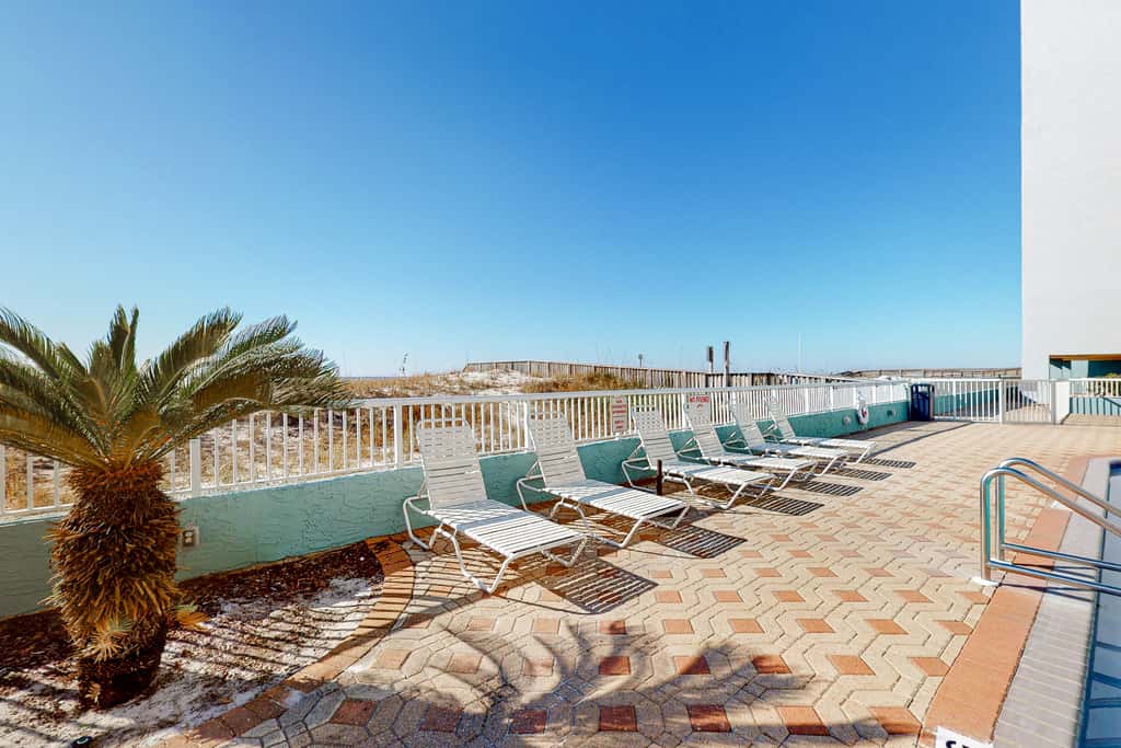 Beautiful beachfront condo with shared pool & beach access!