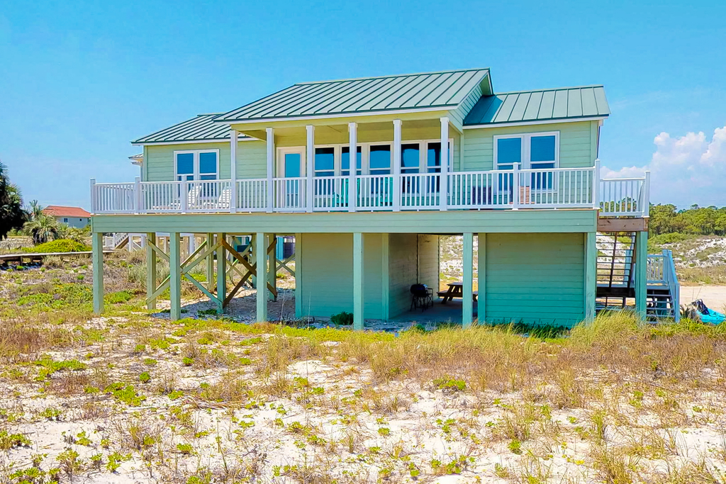 Dog-friendly beachfront bungalow with gorgeous views, outdoor shower, and deck