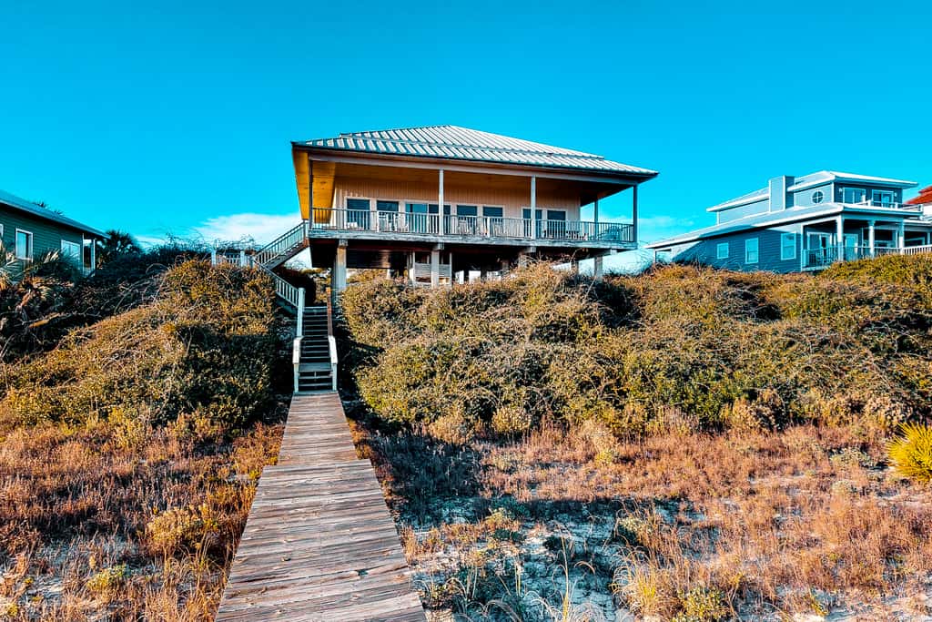 Beachfront dog-friendly home with private hot tub, boardwalk, on-site pools, gym