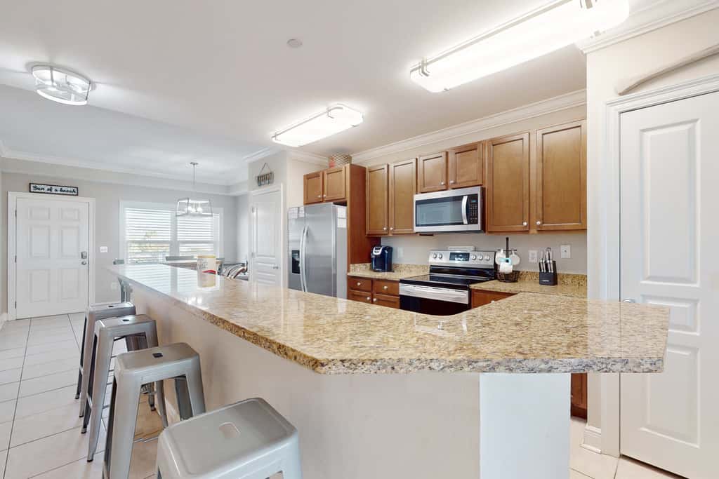 Water-view condo with hot tub, pool, fitness room & balcony - dog-friendly