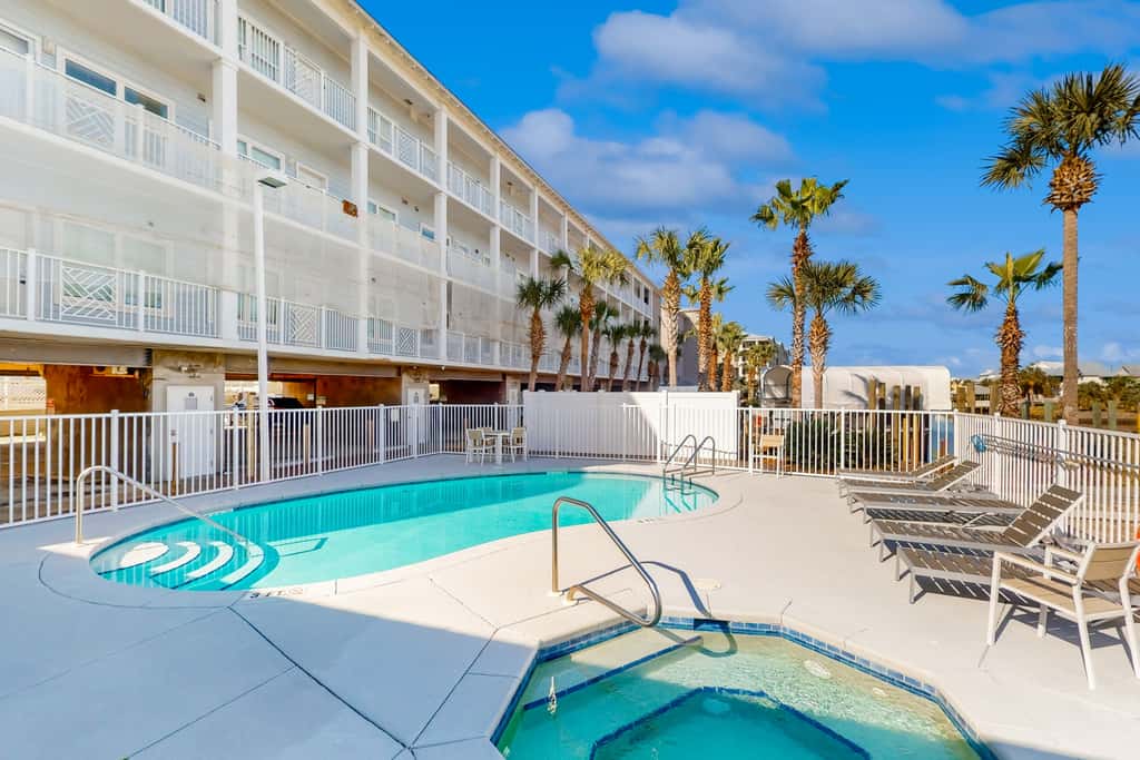 Water-view condo with hot tub, pool, fitness room & balcony - dog-friendly