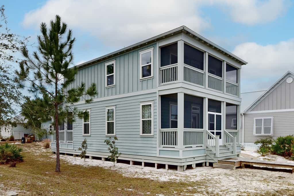 Lovely Home with Screened-In Porches, Balcony & Shared Pool - Walk to the Beach