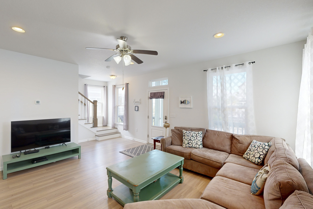 Lovely Home with Screened-In Porches, Balcony & Shared Pool - Walk to the Beach