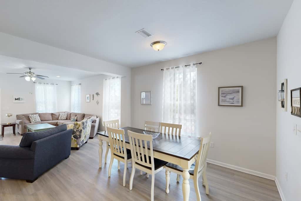 Lovely Home with Screened-In Porches, Balcony & Shared Pool - Walk to the Beach