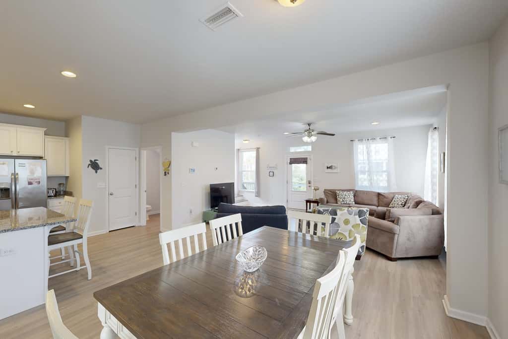 Lovely Home with Screened-In Porches, Balcony & Shared Pool - Walk to the Beach