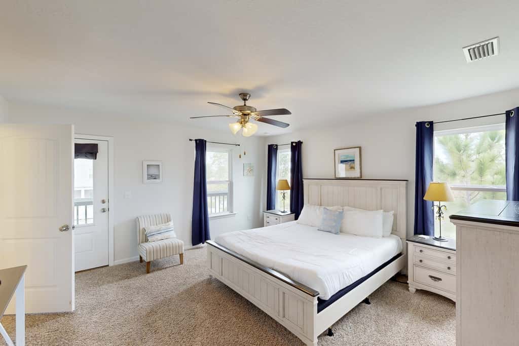 Lovely Home with Screened-In Porches, Balcony & Shared Pool - Walk to the Beach