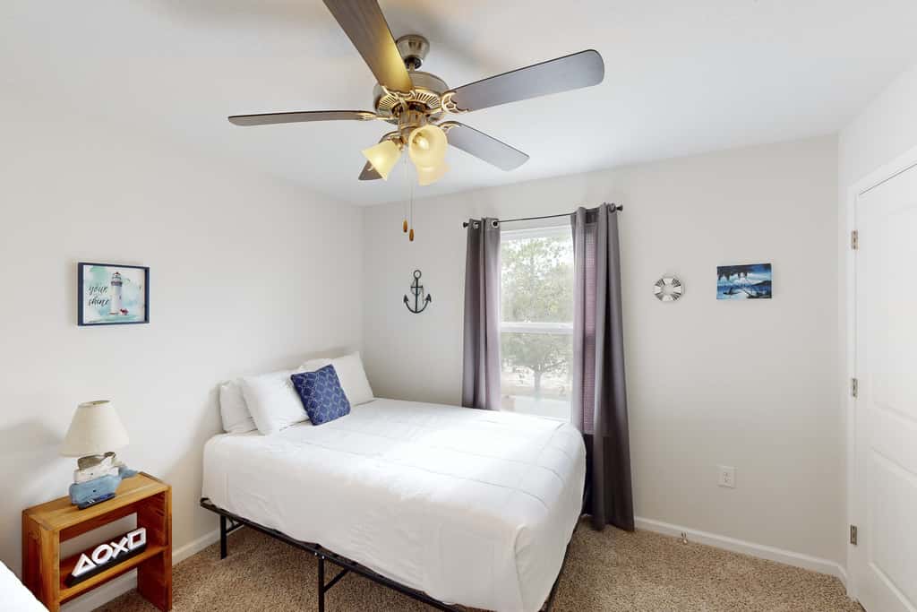 Lovely Home with Screened-In Porches, Balcony & Shared Pool - Walk to the Beach