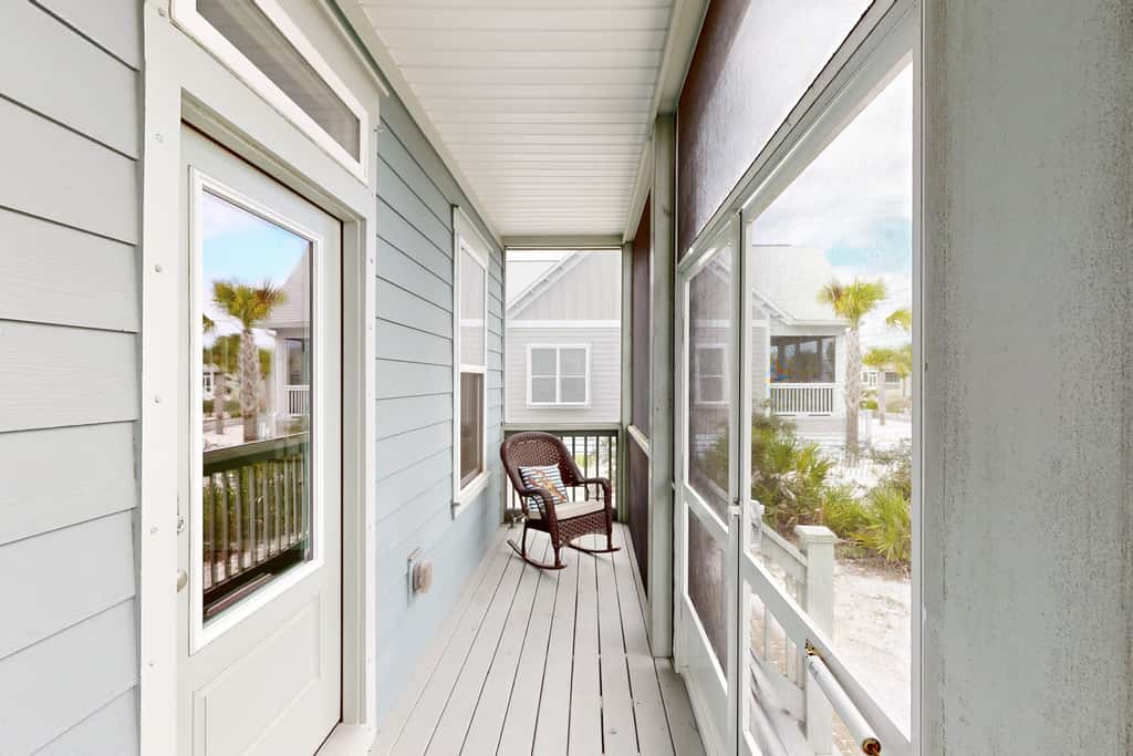 Lovely Home with Screened-In Porches, Balcony & Shared Pool - Walk to the Beach