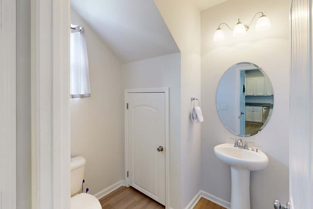 Lovely Home with Screened-In Porches, Balcony & Shared Pool - Walk to the Beach