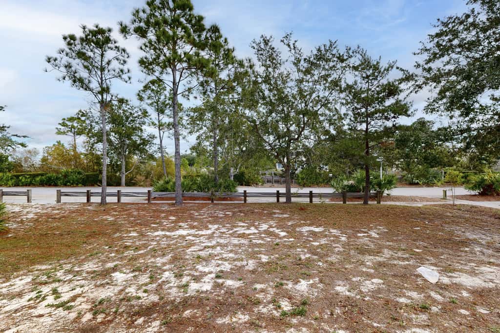 Lovely Home with Screened-In Porches, Balcony & Shared Pool - Walk to the Beach