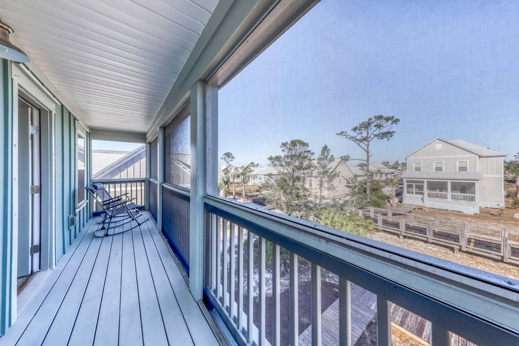 Lovely Home with Screened-In Porches, Balcony & Shared Pool - Walk to the Beach