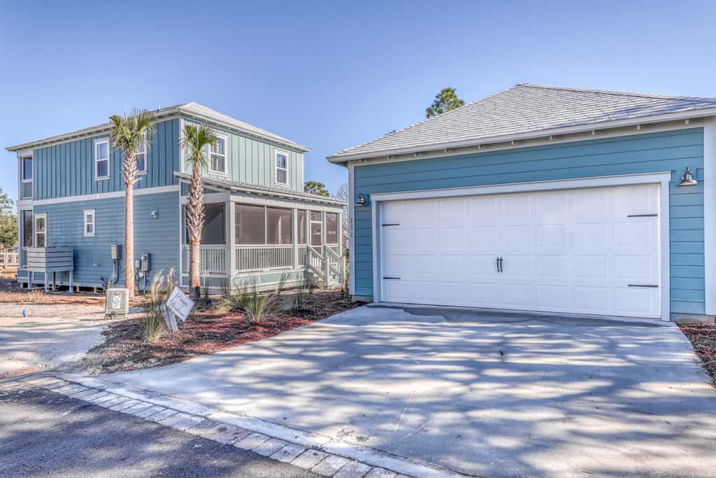 Lovely Home with Screened-In Porches, Balcony & Shared Pool - Walk to the Beach