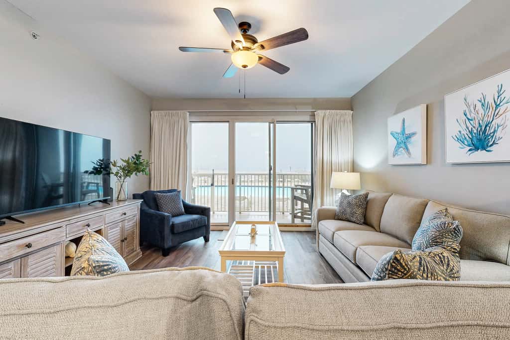 Gulf-front condo with washer/dryer, pools, hot tub, fitness room, & beach access