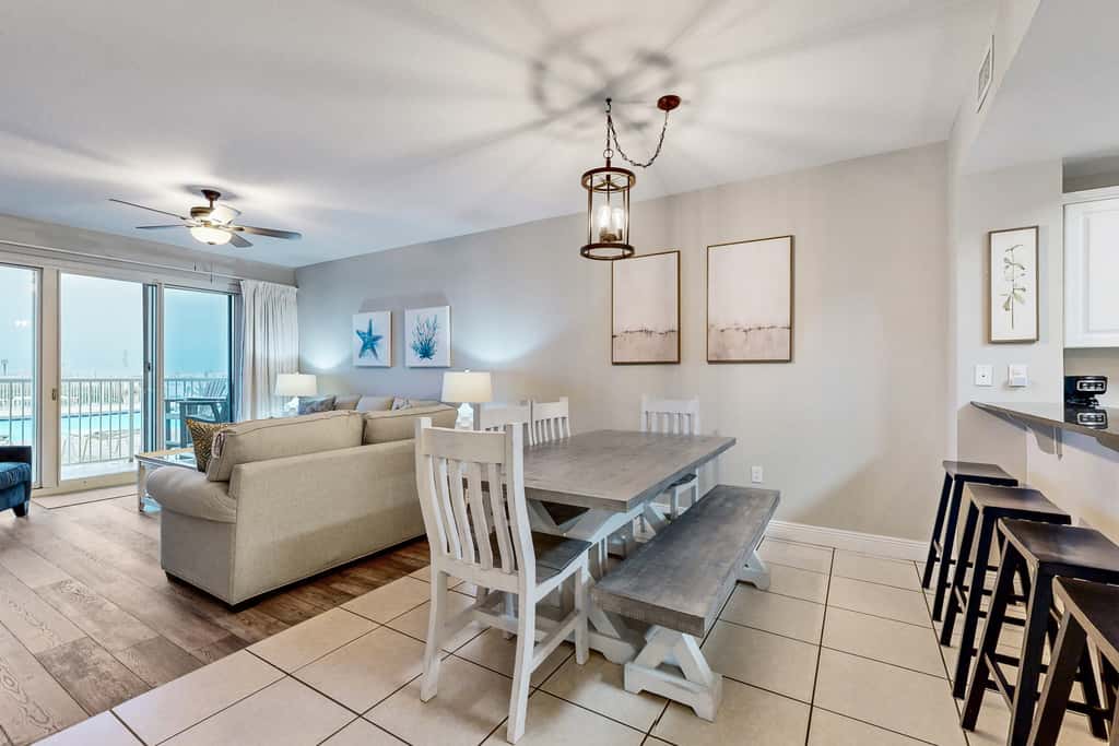Gulf-front condo with washer/dryer, pools, hot tub, fitness room, & beach access