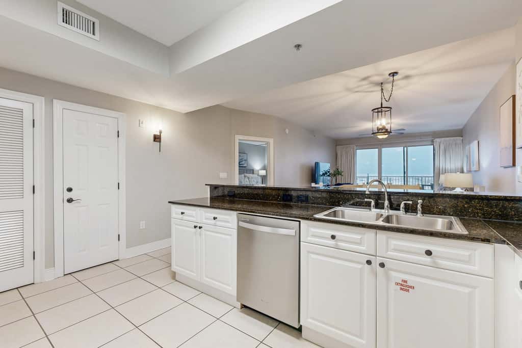 Gulf-front condo with washer/dryer, pools, hot tub, fitness room, & beach access
