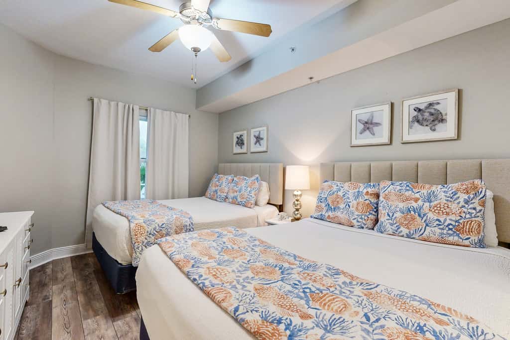 Gulf-front condo with washer/dryer, pools, hot tub, fitness room, & beach access