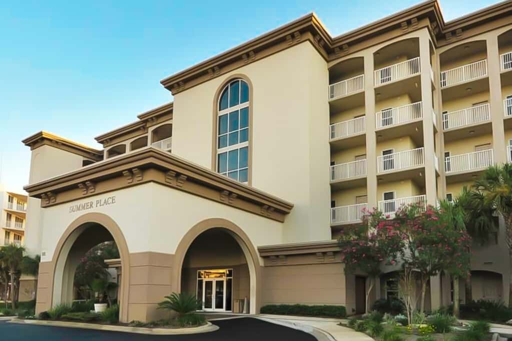 Gulf-front condo with washer/dryer, pools, hot tub, fitness room, & beach access
