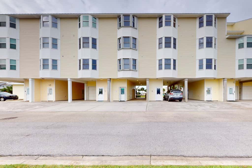 Four-Level Beachfront Townhome with Private Elevator, Free WiFi, & Shared Pool