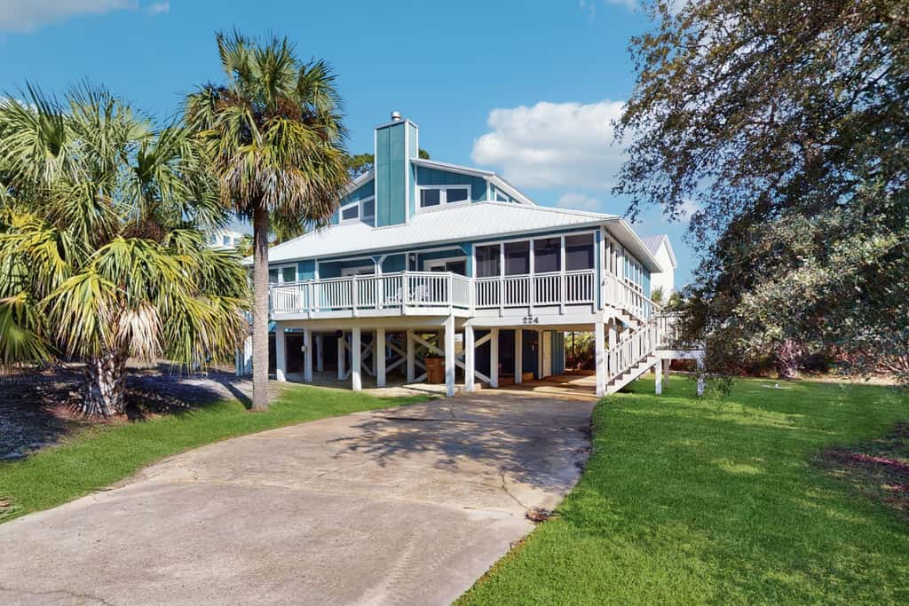 Spacious dog-friendly home with community pool, deck, & WiFi - minutes to beach