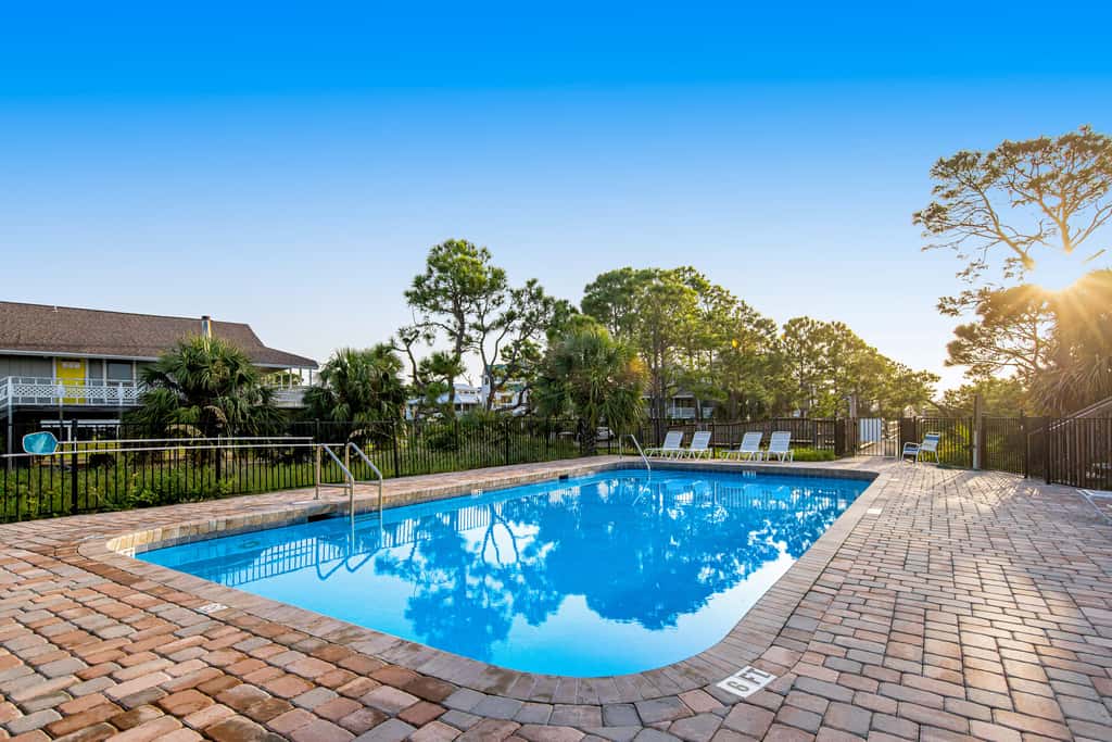Spacious dog-friendly home with community pool, deck, & WiFi - minutes to beach