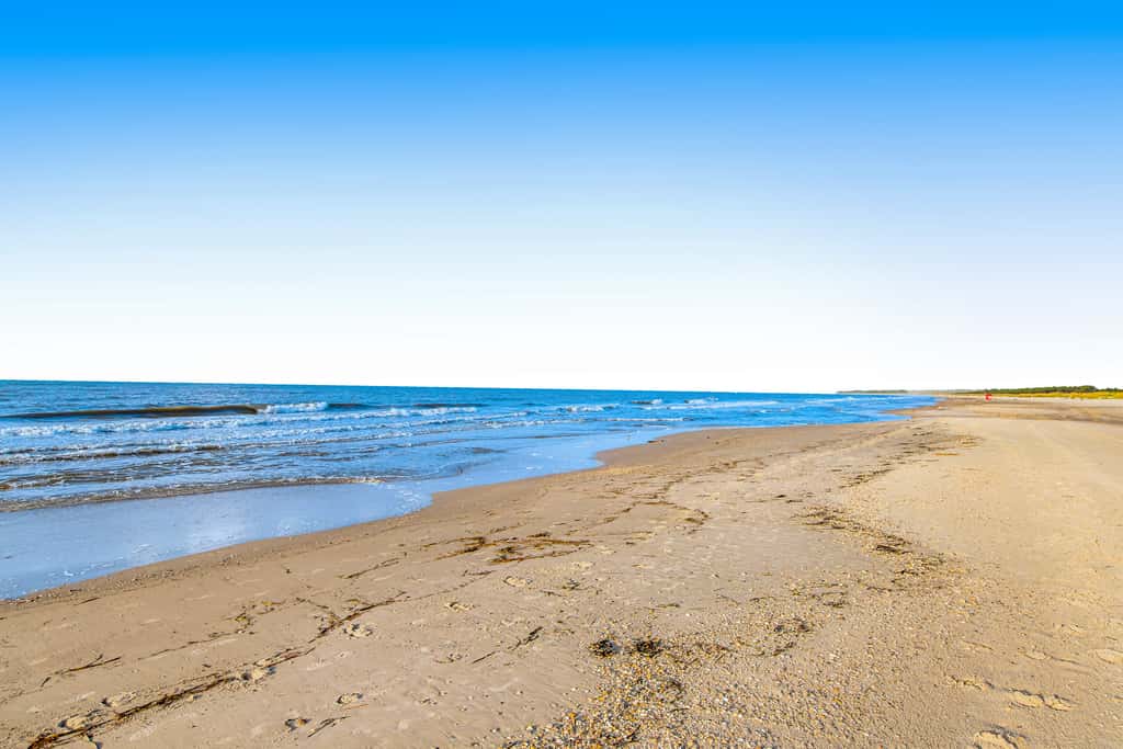 Spacious dog-friendly home with community pool, deck, & WiFi - minutes to beach