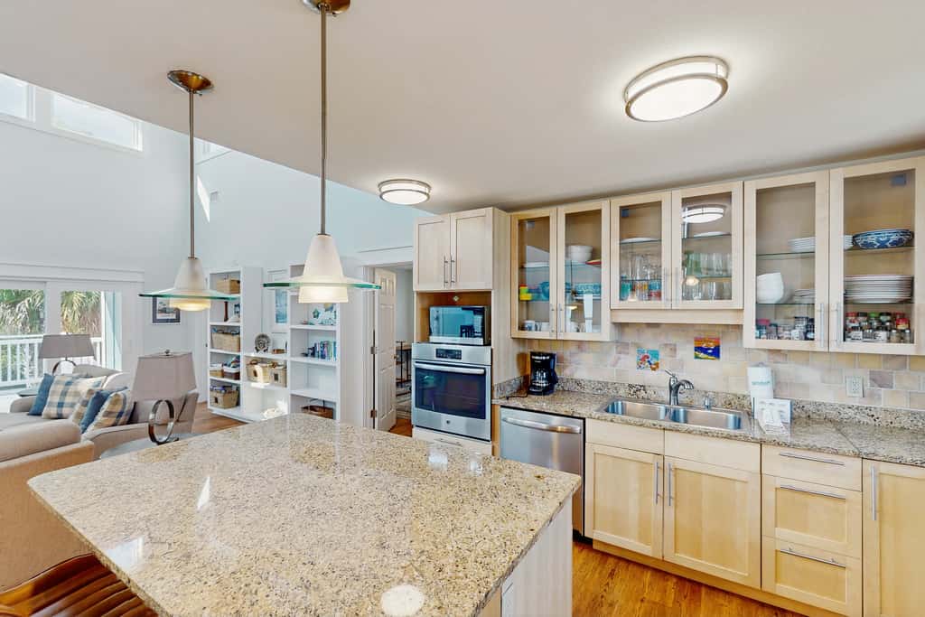 Spacious dog-friendly home with community pool, deck, & WiFi - minutes to beach
