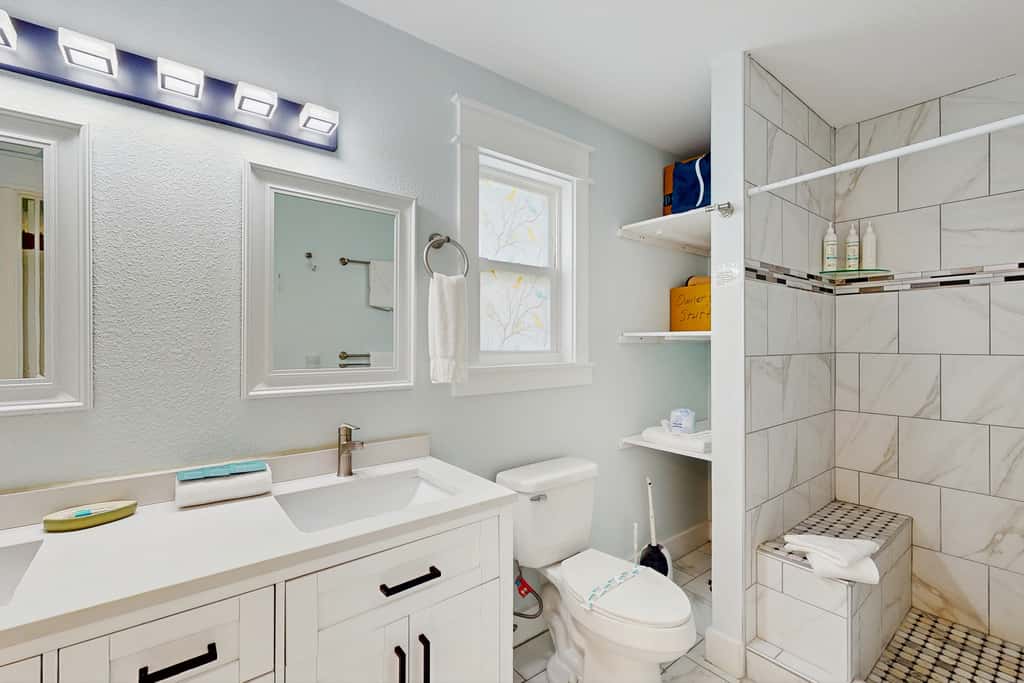 Spacious dog-friendly home with community pool, deck, & WiFi - minutes to beach