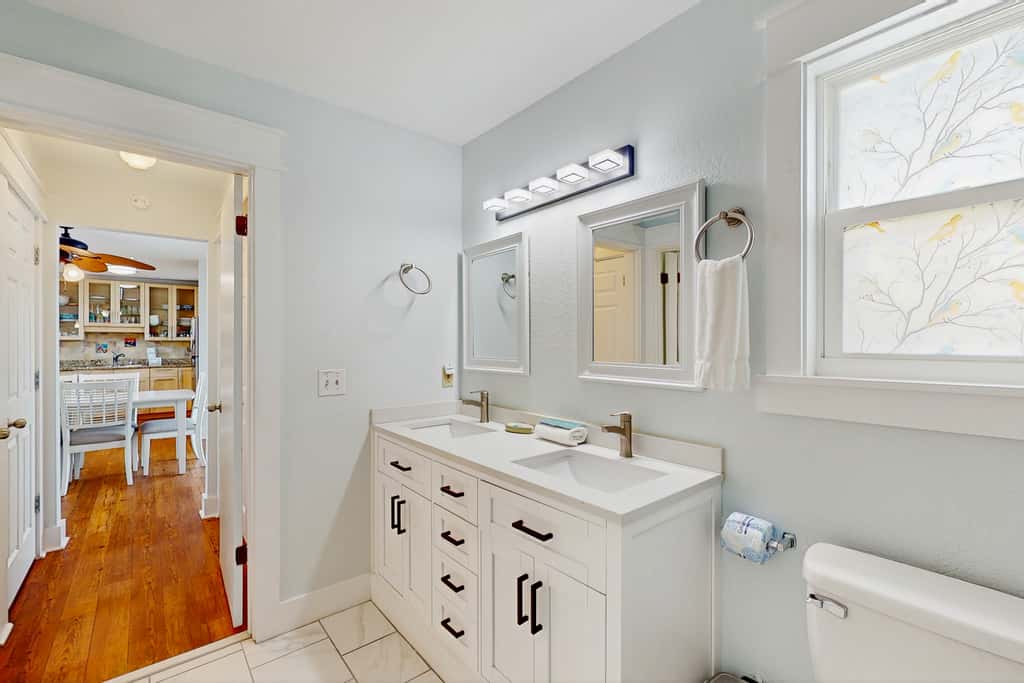 Spacious dog-friendly home with community pool, deck, & WiFi - minutes to beach