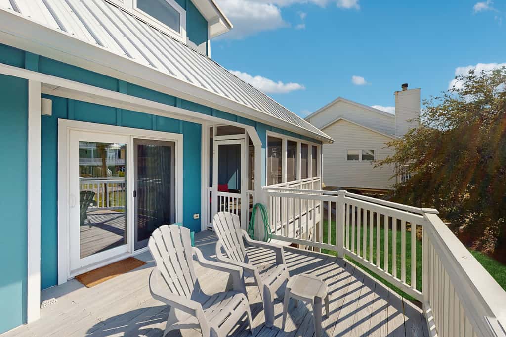 Spacious dog-friendly home with community pool, deck, & WiFi - minutes to beach