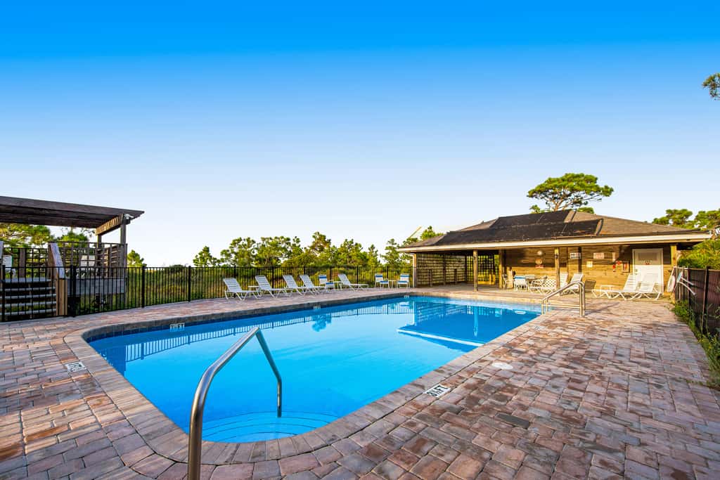 Spacious dog-friendly home with community pool, deck, & WiFi - minutes to beach