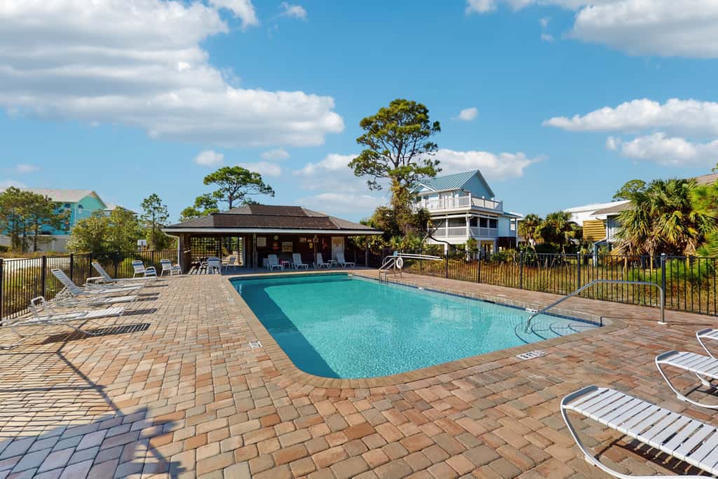 Spacious dog-friendly home with community pool, deck, & WiFi - minutes to beach