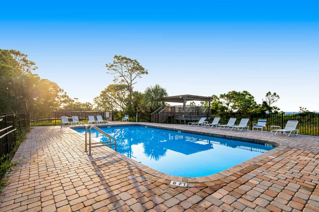 Spacious dog-friendly home with community pool, deck, & WiFi - minutes to beach