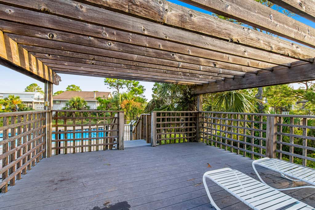 Spacious dog-friendly home with community pool, deck, & WiFi - minutes to beach