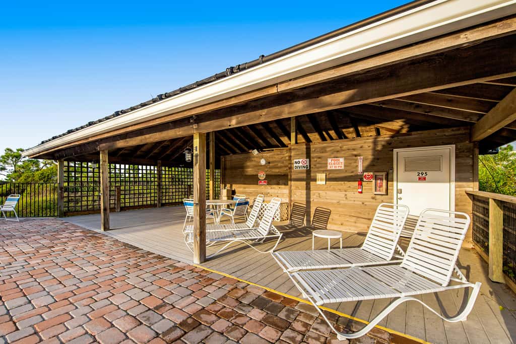 Spacious dog-friendly home with community pool, deck, & WiFi - minutes to beach