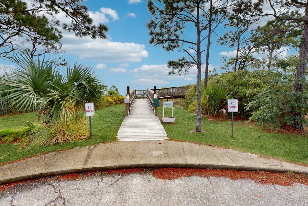 Spacious dog-friendly home with community pool, deck, & WiFi - minutes to beach