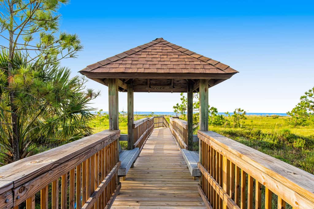 Spacious dog-friendly home with community pool, deck, & WiFi - minutes to beach