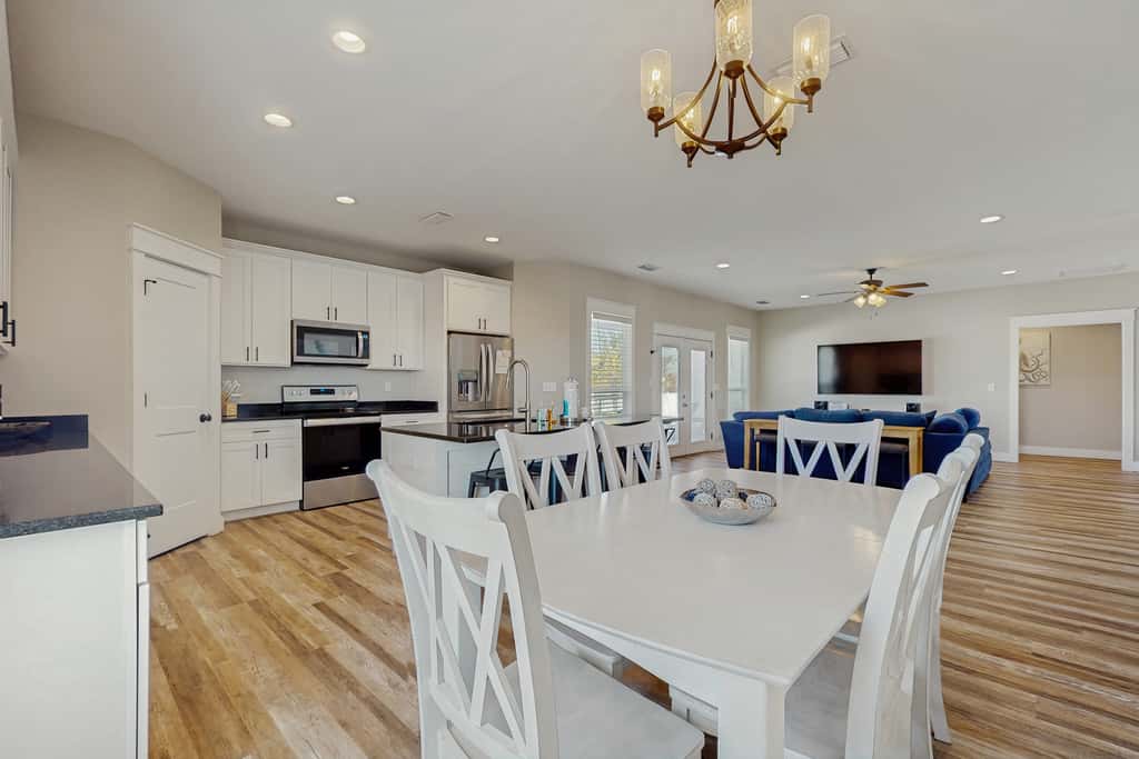 Dog friendly, coastal retreat with fenced yard, private pool, golf cart and cove