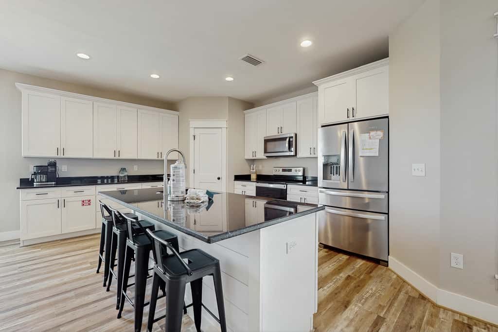 Dog friendly, coastal retreat with fenced yard, private pool, golf cart and cove